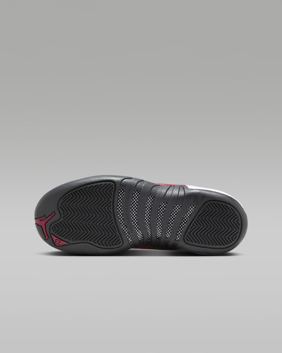 Air Jordan 12 Retro Taxi Flip Big Kids Shoes. Nike